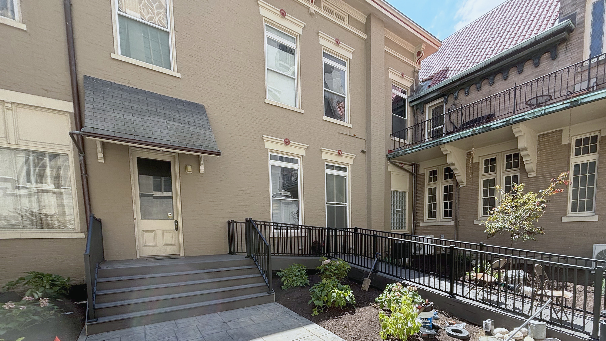 Composite decking on the original footprint, with a brand-new railing